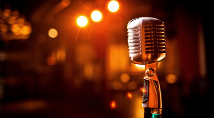 Microphone with stage lights behind it